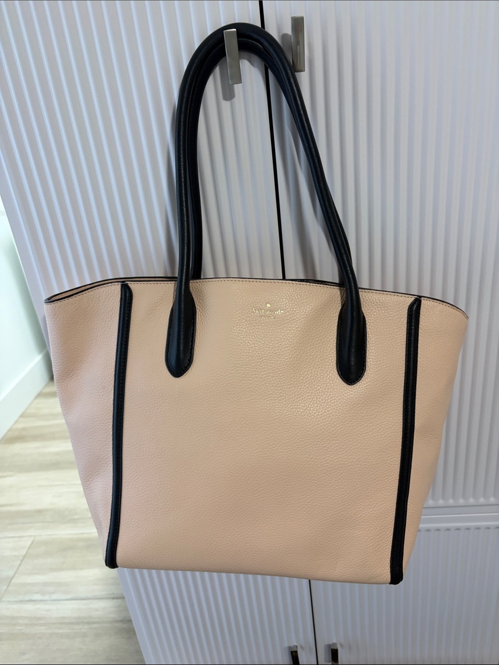 Kate spade blush leather tote with black trim. Excellent Condition!